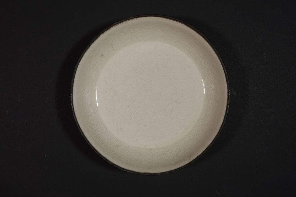 定窑白釉印花蟠螭缠枝花卉纹洗洗心